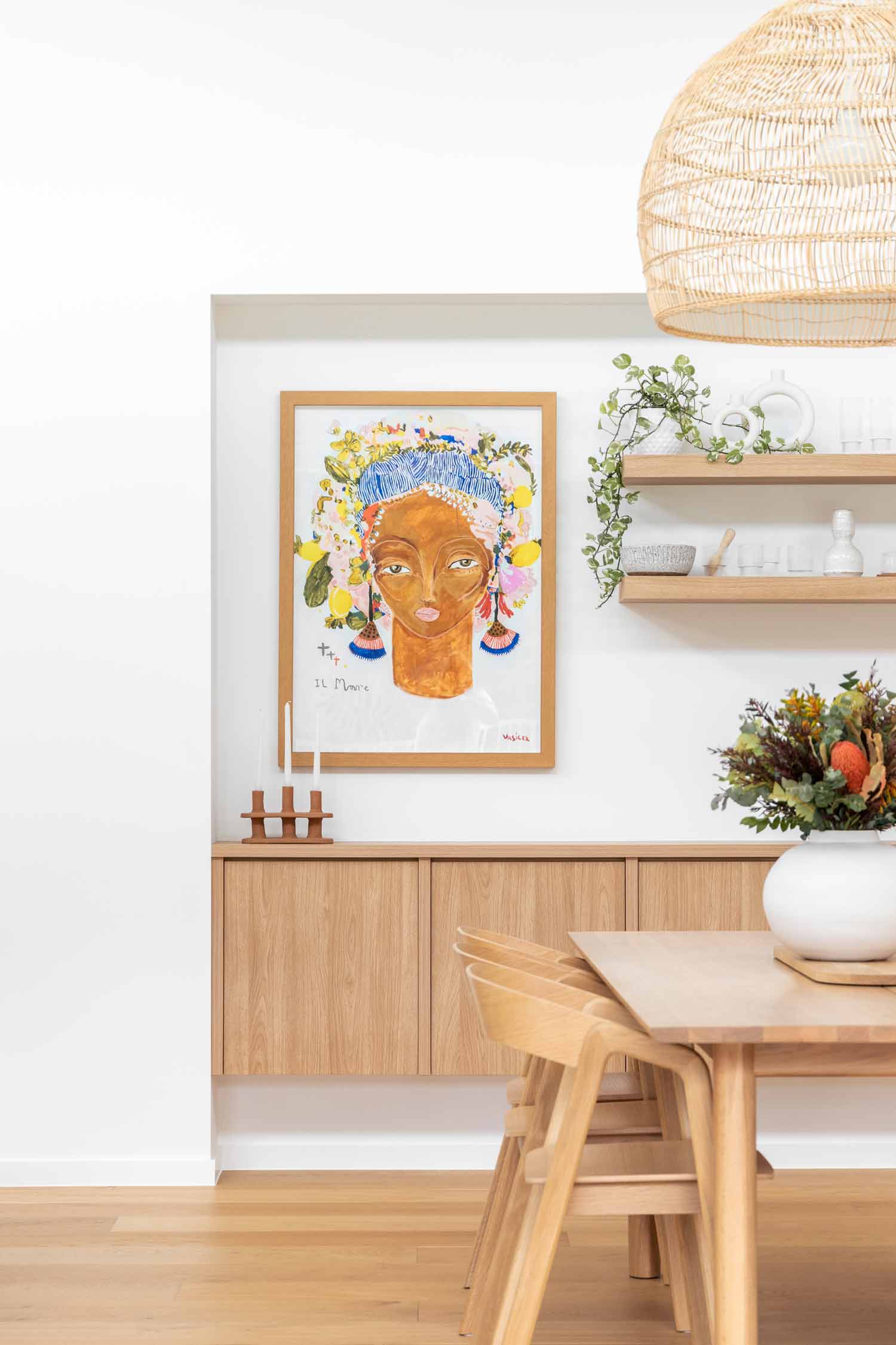 Bright-Bold-Matisse-art-for-living-room-and-dining-room-walls-framed-in-warm-timber-to-match-the-open-shelving-and-joinery