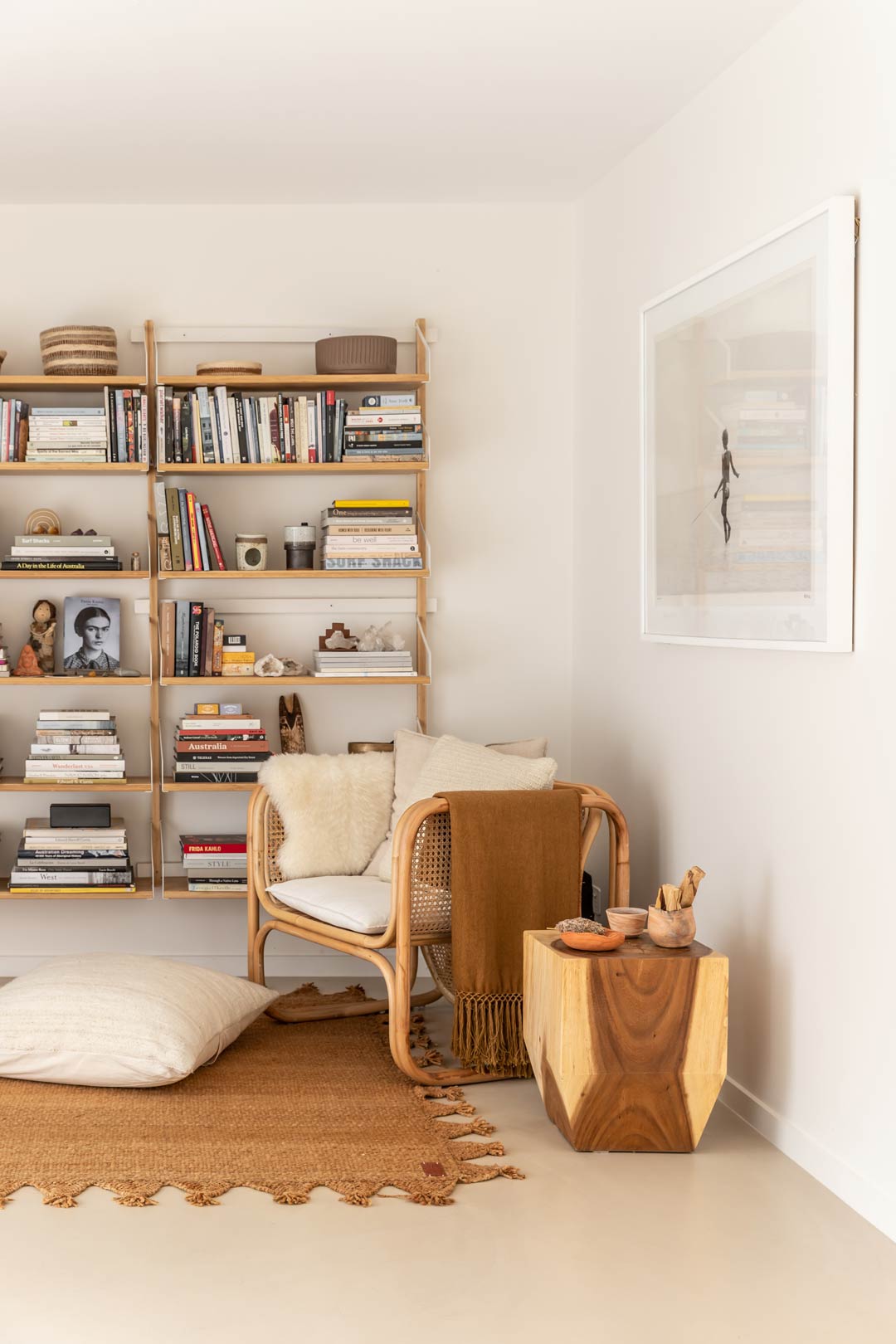 A-cosy-layered-reading-nook-in-a-hygge-space-with-warm-tones-and-soft-furnishings