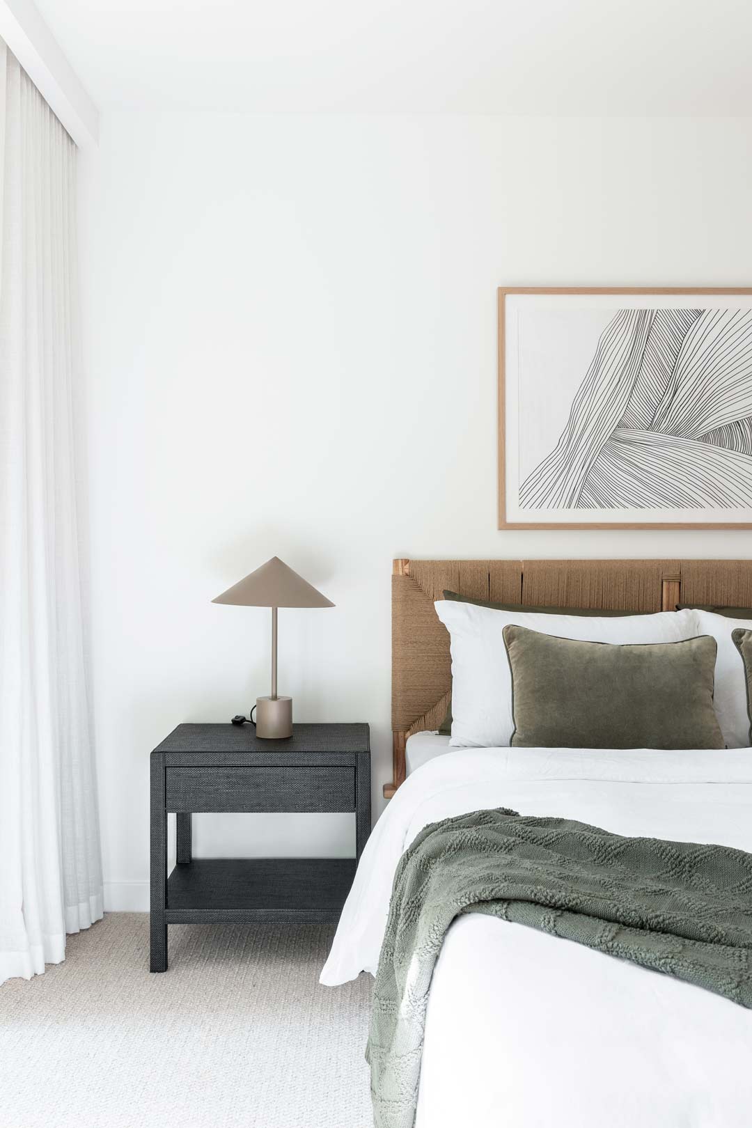 Hygge-interior-decor-in-this-bedroom-is-neutral-with-a-hint-of-sage-and-kahki-green-creating-a-cosy-atmosphere