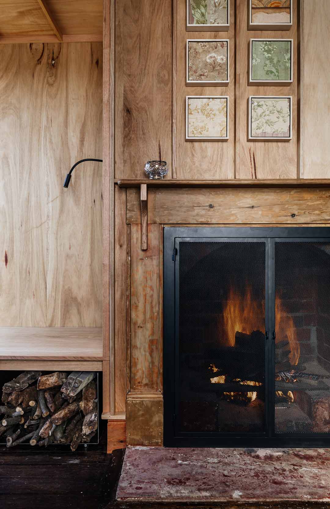 A-cosy-cabin-with-warm-timber-and-a-fireplace-embodies-a-hygge-lifestyle-aesthetic
