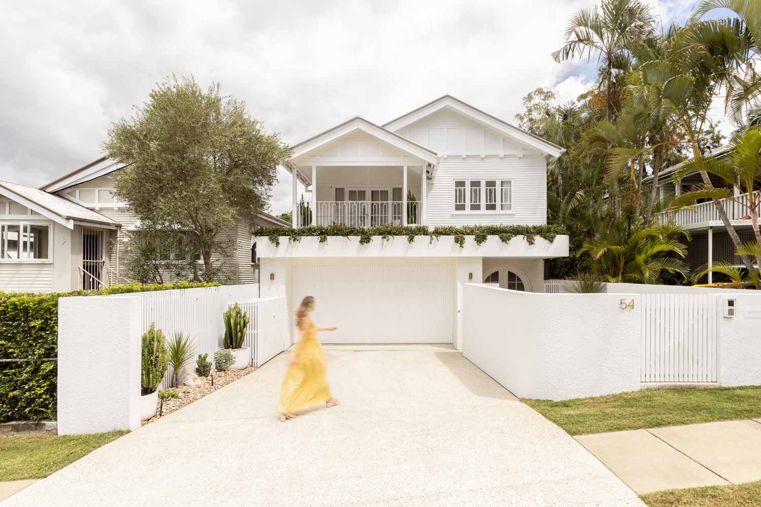 Blanca: A Reimagined Queenslander Home Where Arch French Doors and Marble Stone Honour Its Heritage